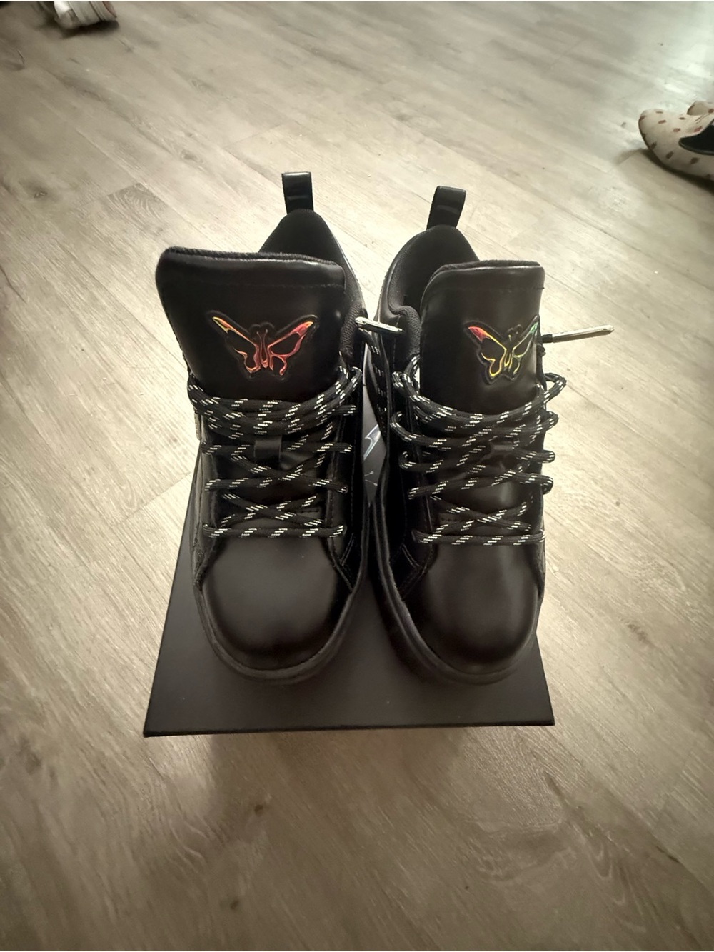 Puma Black High-Top Boots with Multicolor Butterfly Accent